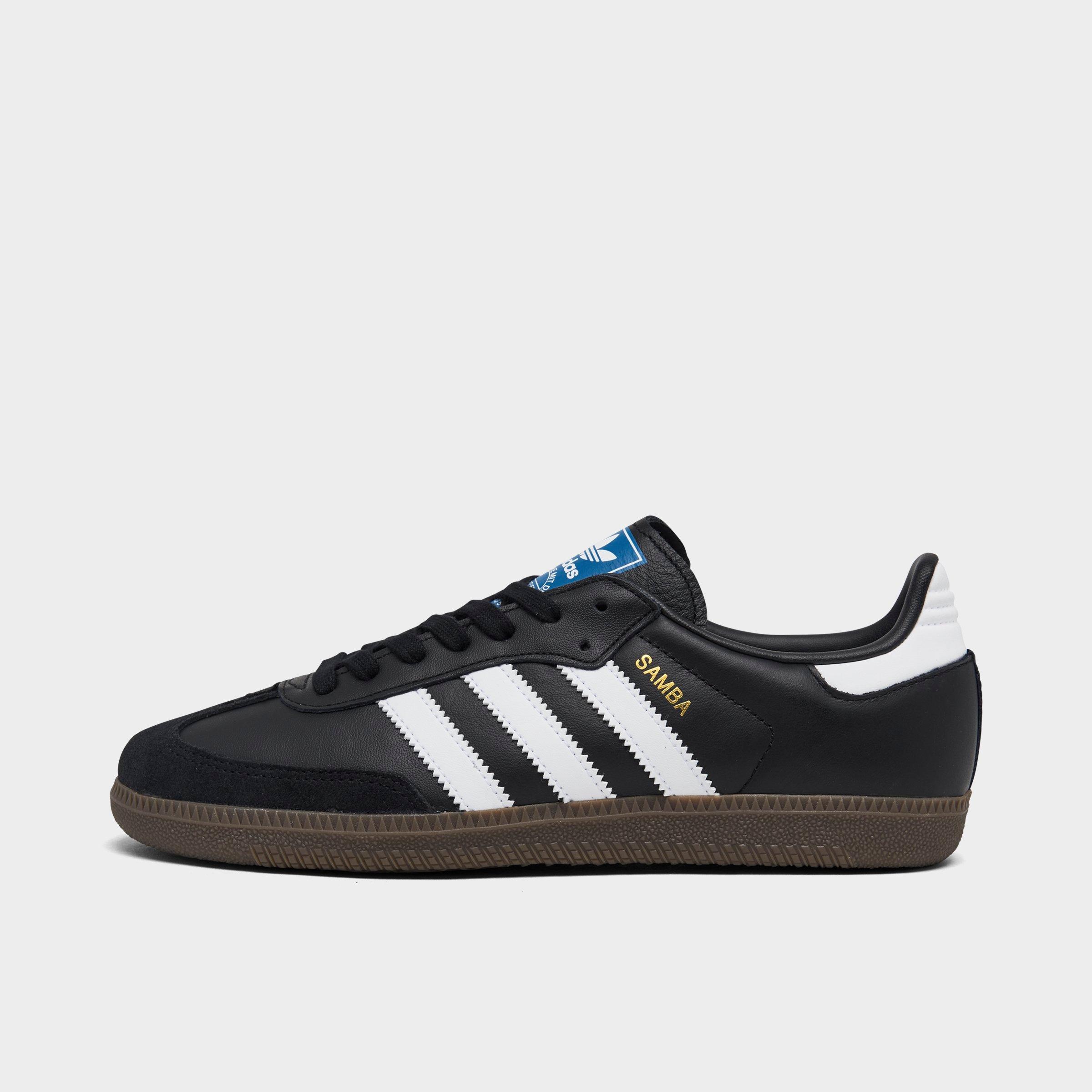 Adidas Originals Low-top Rubber Sole Sneakers With Contrast Stripes In Black