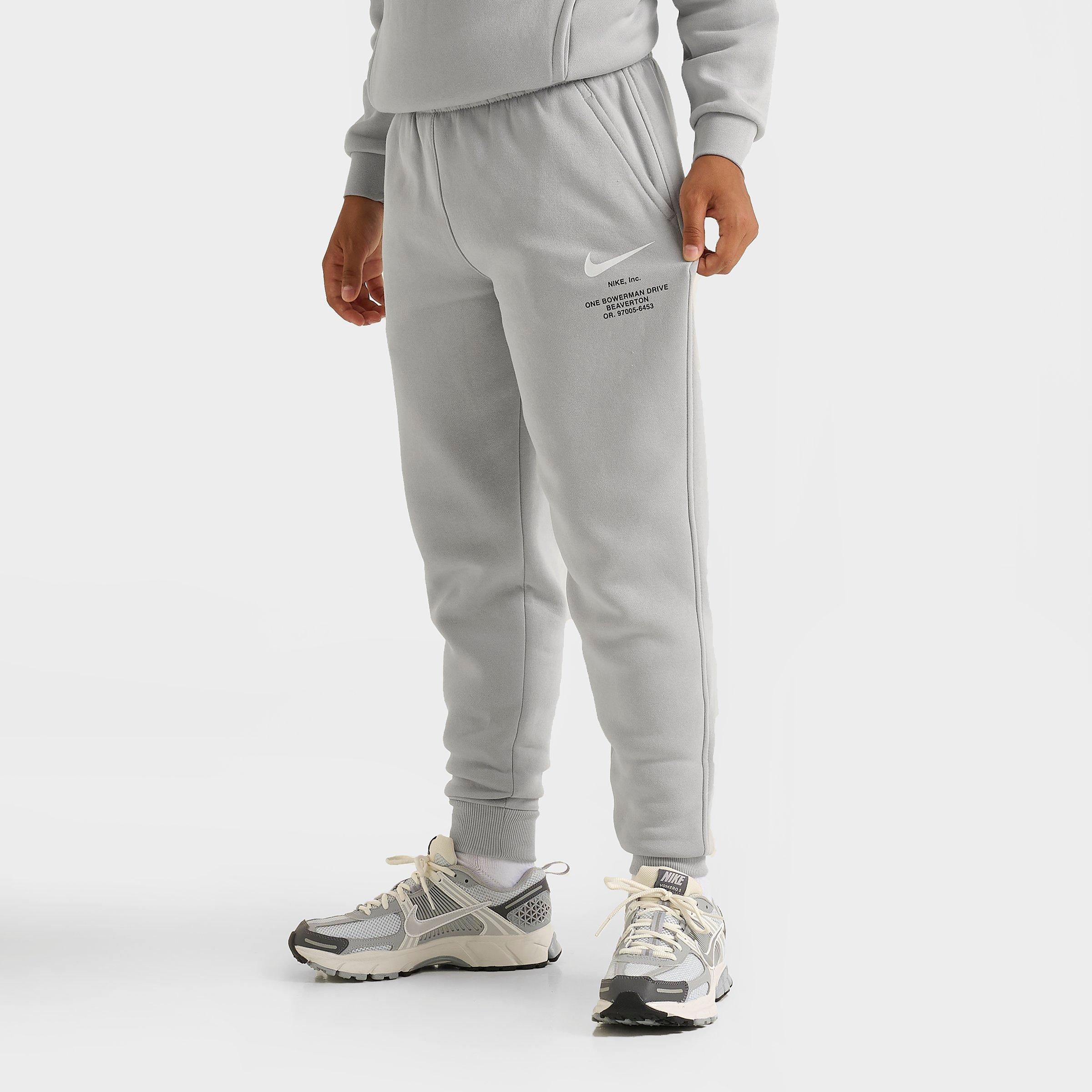 Nike Big Kids Sportswear Fleece Jogger Pants in Light Smoke Grey/White Size: Small