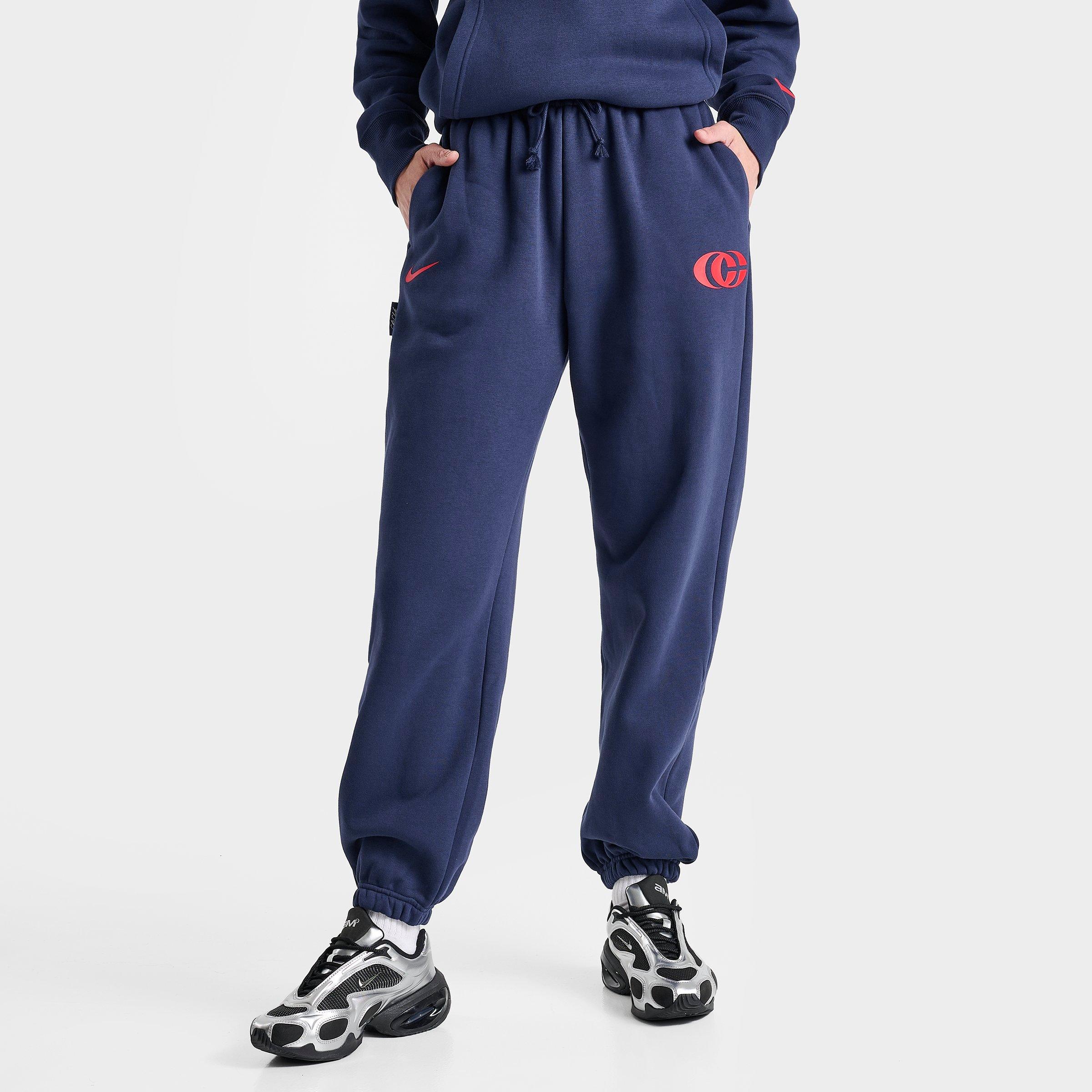 Nike Women's Caitlin Clark Essential Fleece Pants in Midnight Navy/University Red/University Red Size: XS