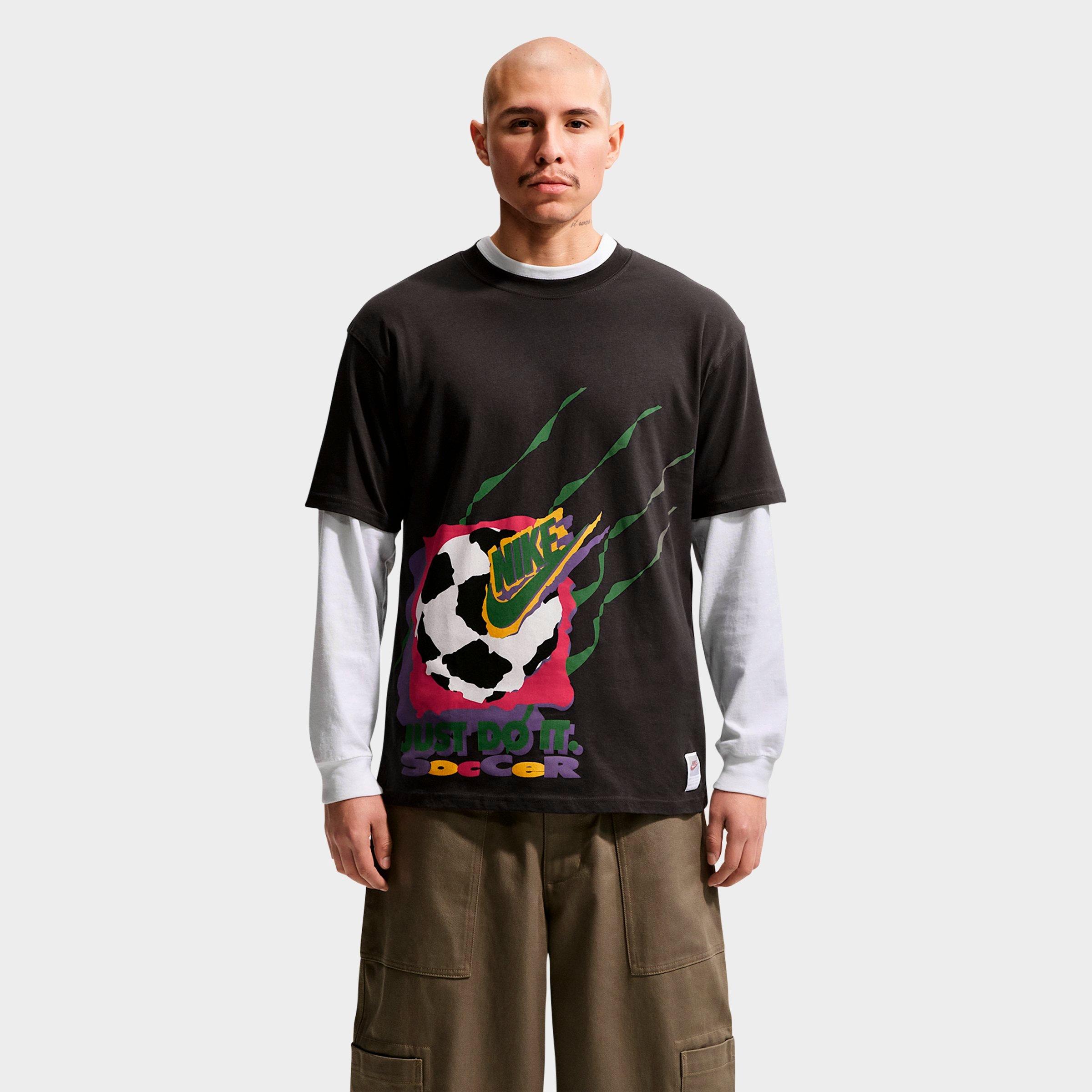 Nike Men's Sportswear Soccer DNA Retro Graphic T-Shirt in Off Noir Size: Medium