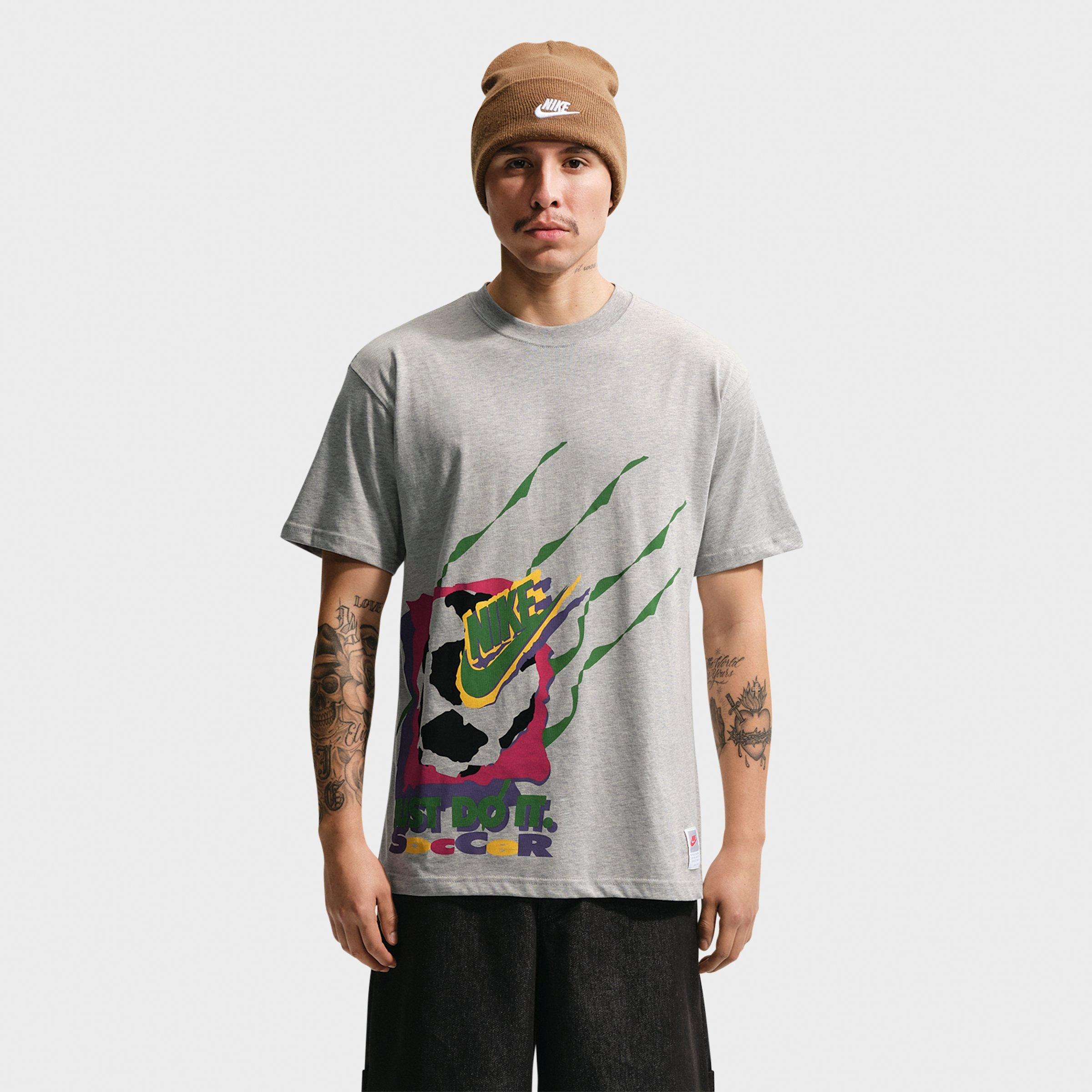 Nike Men's Sportswear Soccer DNA Retro Graphic T-Shirt in Grey Heather Size: 2XL