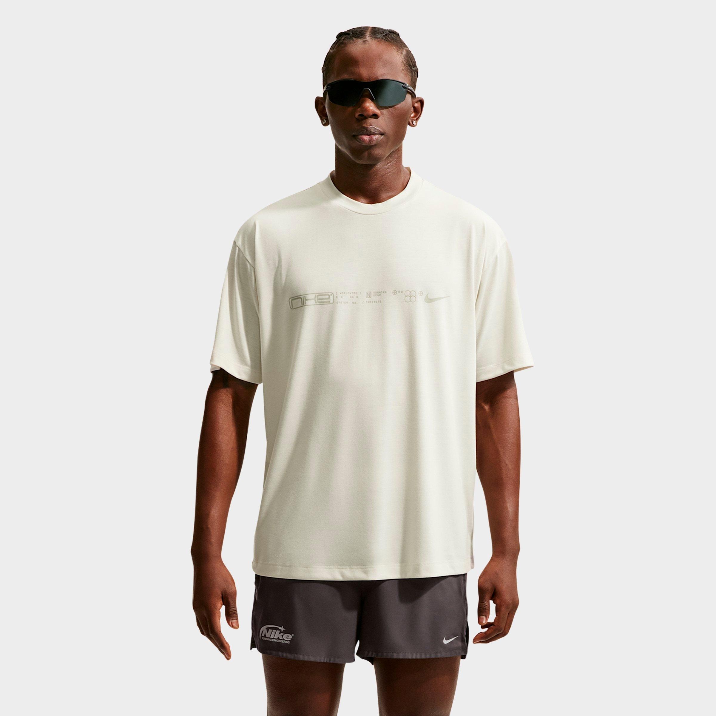 Nike Men's Disrupt Dri-FIT Short-Sleeve Running Top in Sea Glass/Saffron Quartz Size: Small