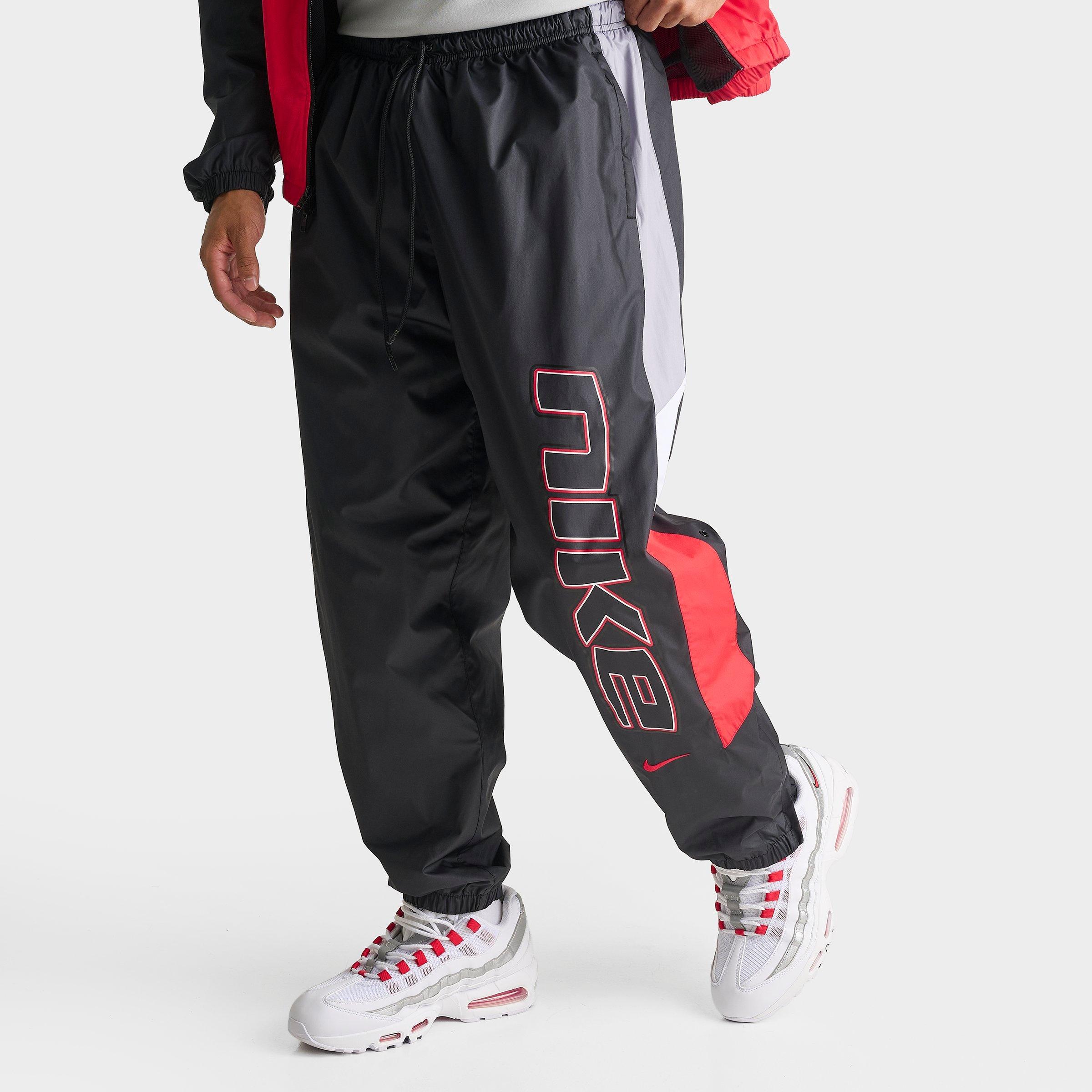 Nike Men's Sportswear Windrunner Lined Track Pants in Black/University Red/Cement Grey Size: XL