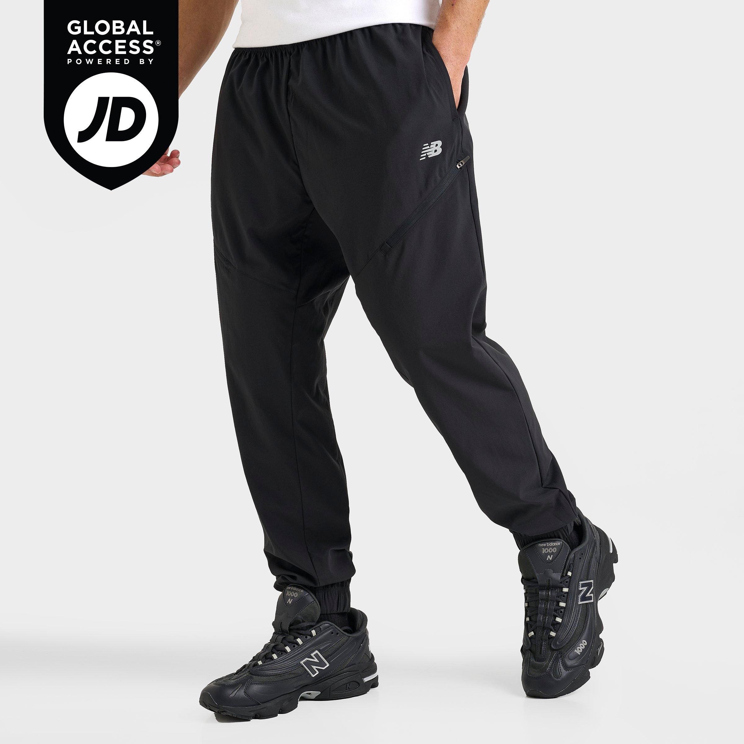New Balance Men's Woven Zip Pocket Jogger Pants in Black Size: Small