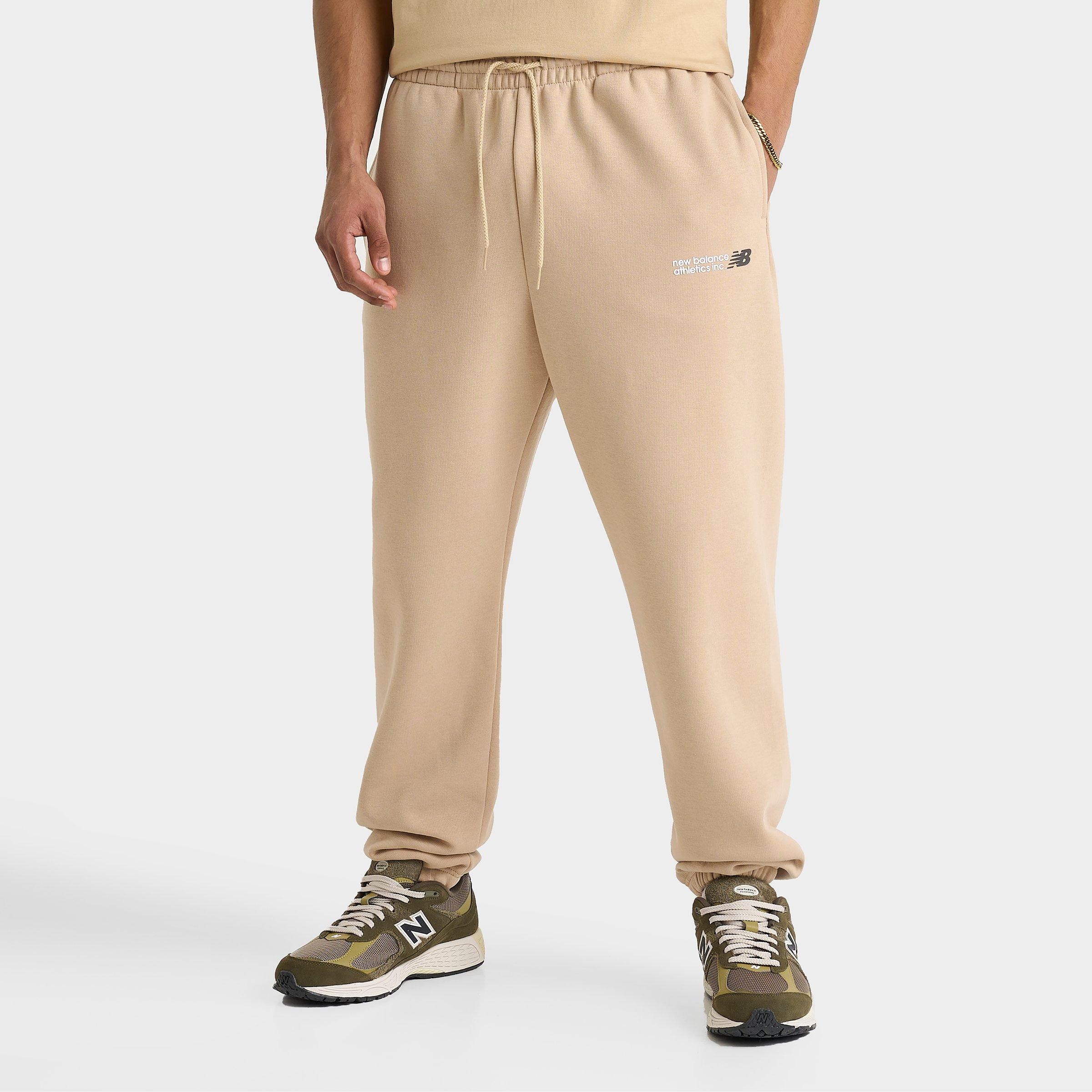 New Balance Men's Athletics Flying NB Logo Jogger Sweatpants in Beige/Incense Size 2XL Cotton/Fleece