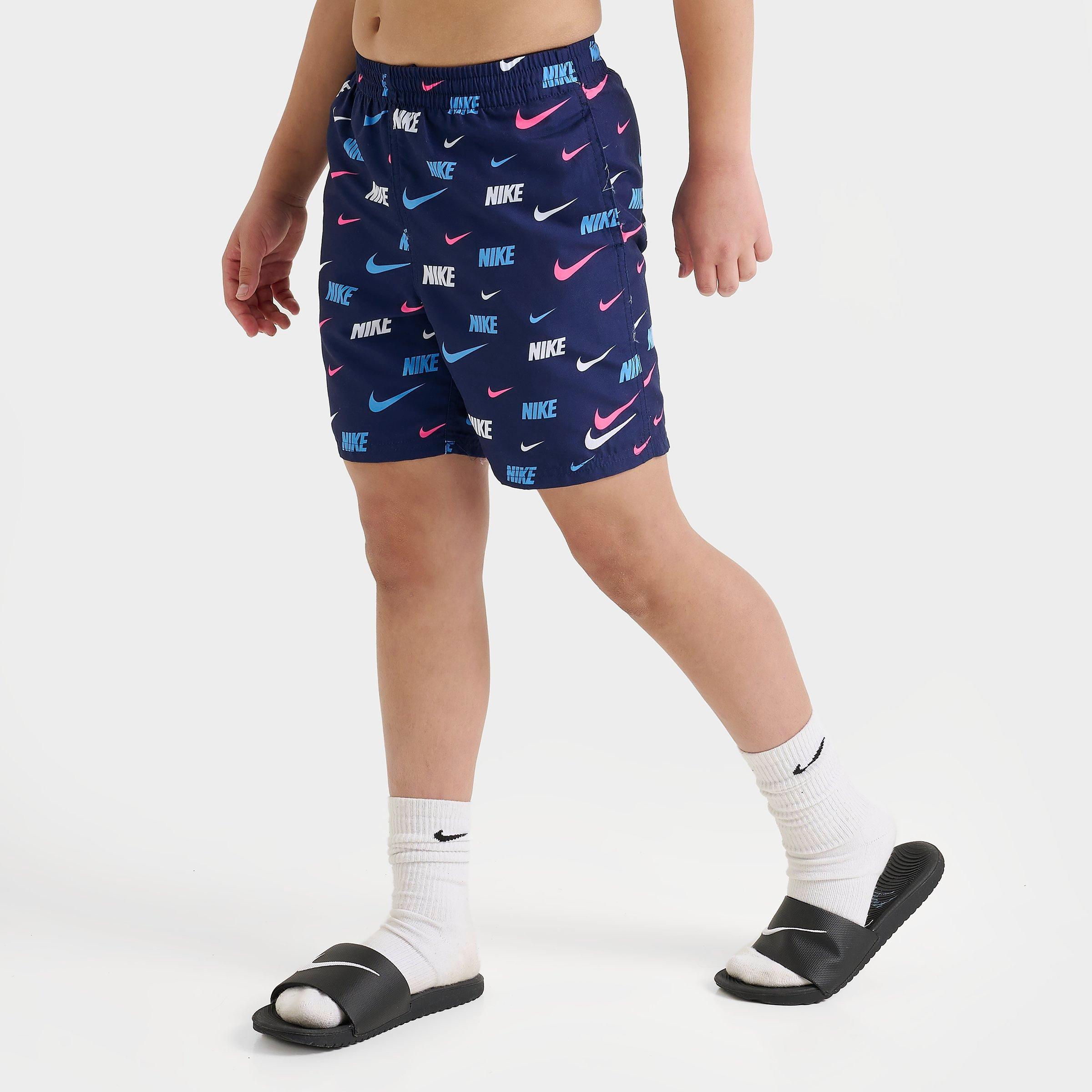 Nike Big Kids Swoosh Allover Print Swim Shorts in Navy/Pink/University Blue Size: Small