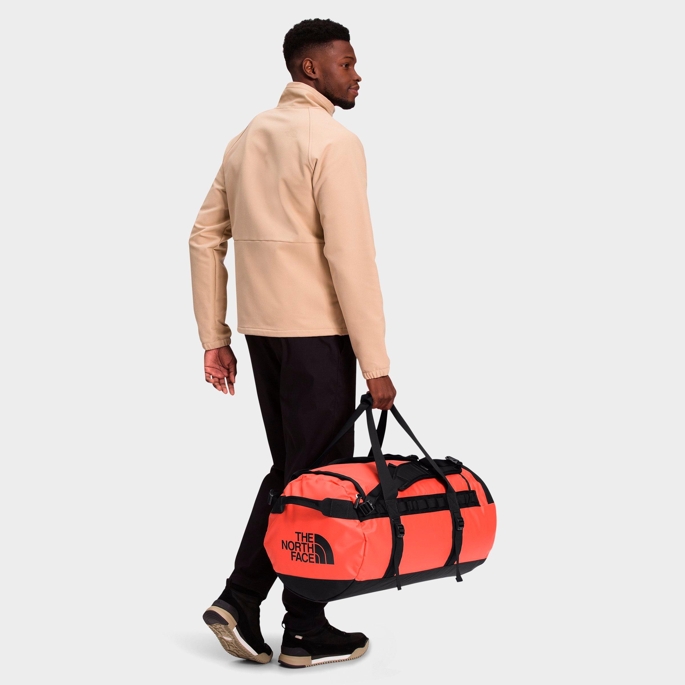 The North Face Inc Base Camp Medium Duffel Bag In Retro Orange
