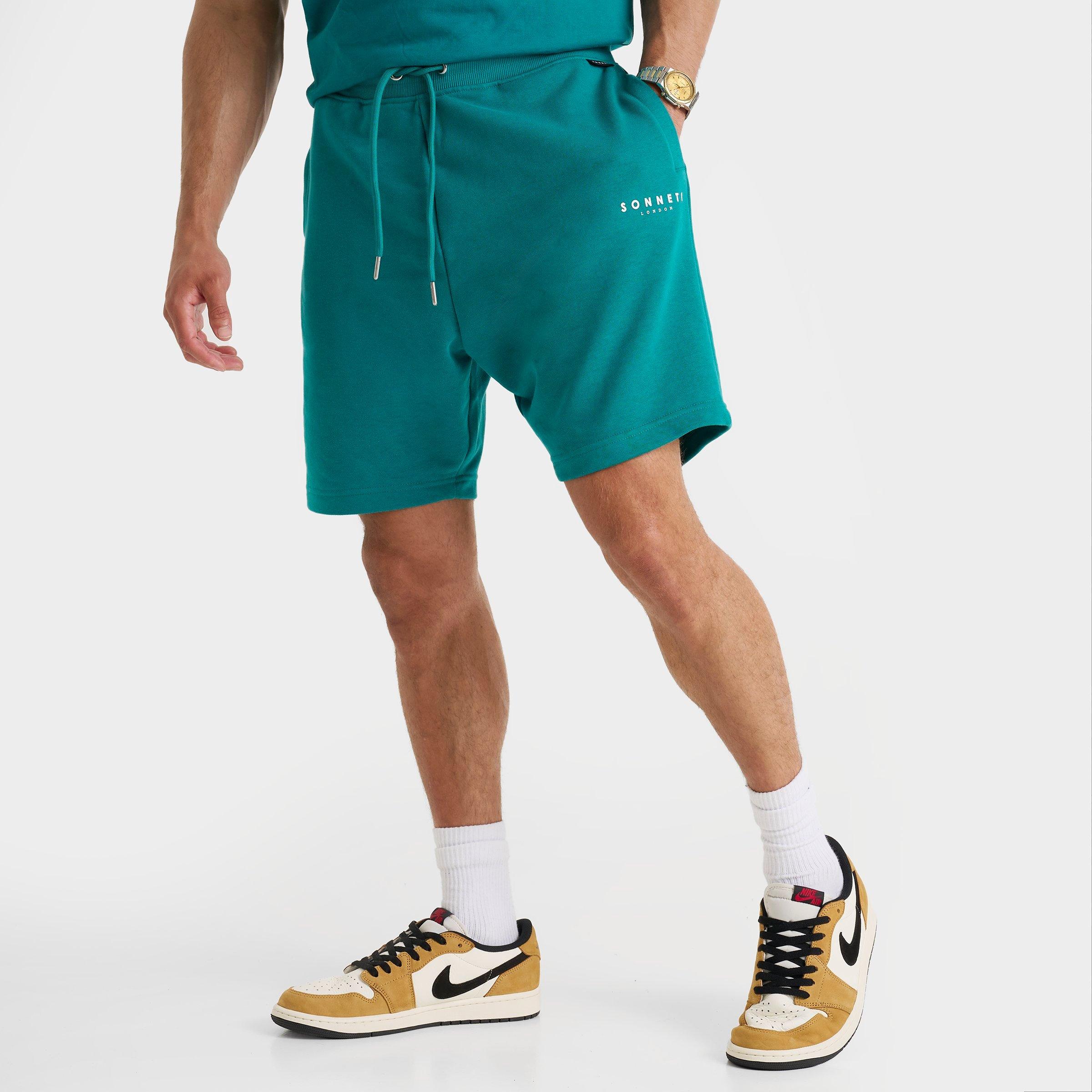 Sonneti Men's French Terry 7" Brom Shorts in Teal Size: XS