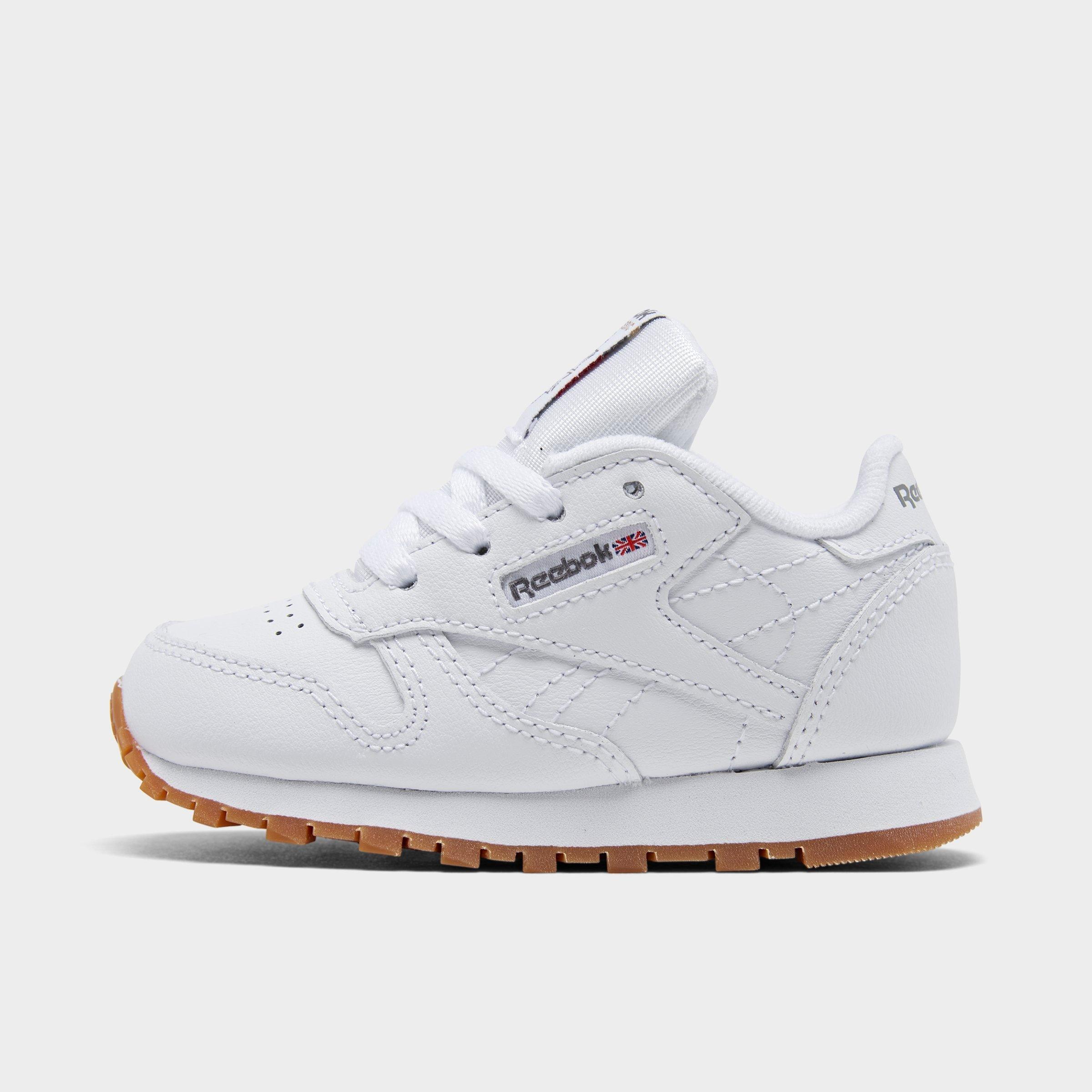 white reebok with bubble gum bottom