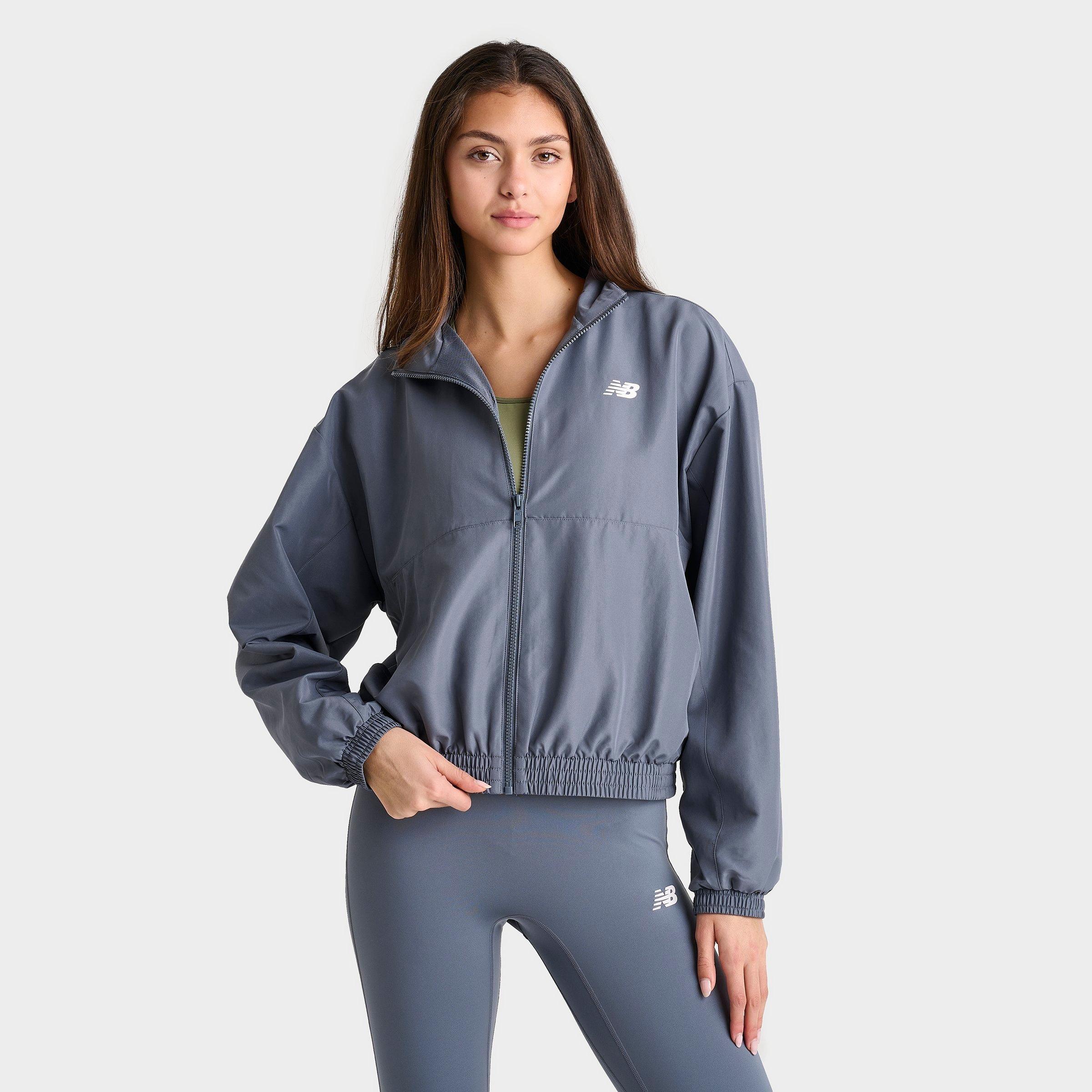 Shop New Balance Women's Linear Woven Jacket In Dark Arctic